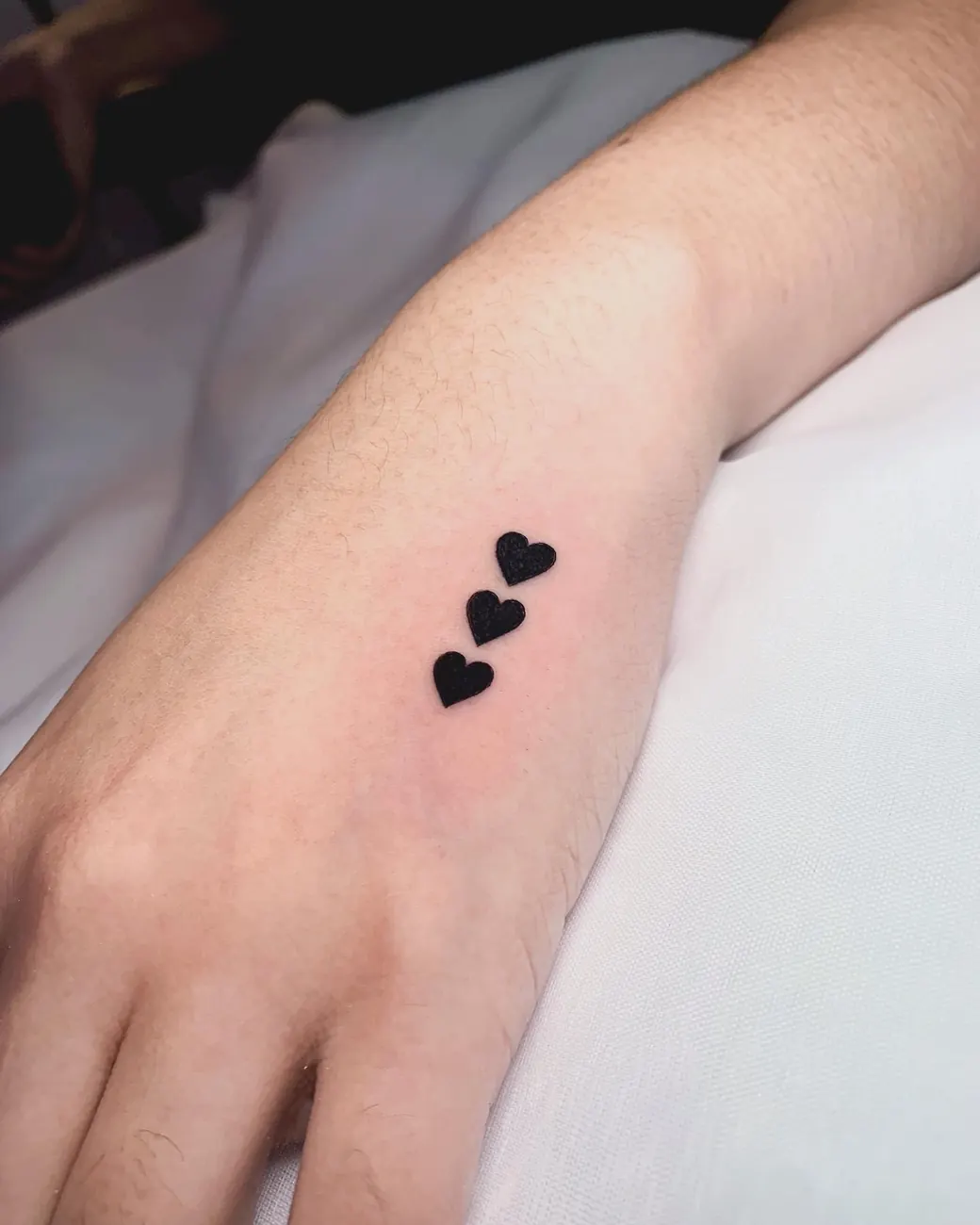 Tatuaje: Corazones, mano